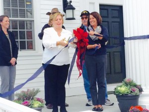 Significant concentration involved with the ribbon cutting with Kristin O'Malley of the Cape Cod Foundation, Ralph Herbst, Clerk of the Works Jim Vieira and FHT board chair Addie Drolette.   
