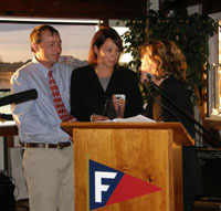 Executive Director Anne E. Connolly presents Bruce Espey Community Service award posthumously in honor of Diane Thompson to her children, Liz and Lee Thompson