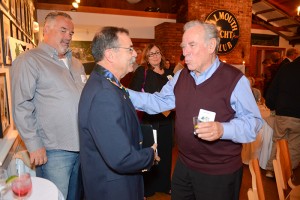  Joe Martinho is congratulated by Gene Black           